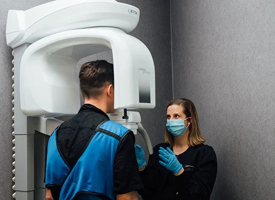 A patient getting an X-Ray by a dental nurse - Dentist in Bakersfield, CA