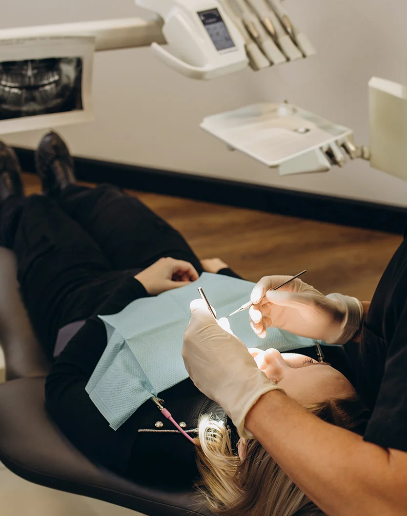 Blonde woman getting a dental exam - Sedation IV in Bakersfield, CA